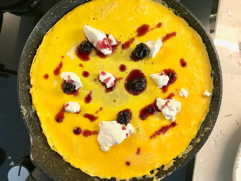 Blackberry Jam Omelette with Cream Cheese in Pan Ready To Eat Stock