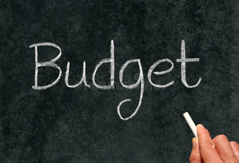 Budget, written with white chalk on a blackboard. Budget, written with white chalk on a blackboard.