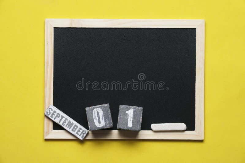 Blackboard with Chalk Yellow Background and September 01 on Calendar