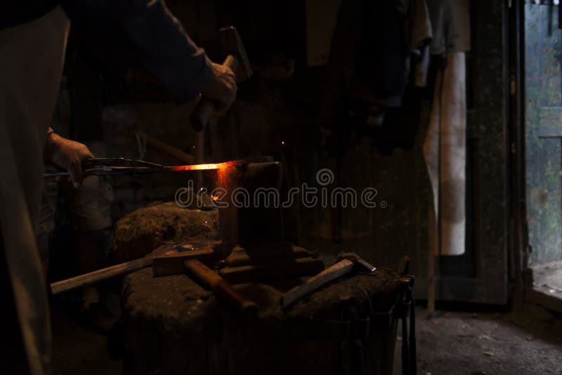 Blacksmith You Are Making Mjolnir For The Forging Exam Blacksmith in His Workshop Forging Stock Image - Image of horizontal