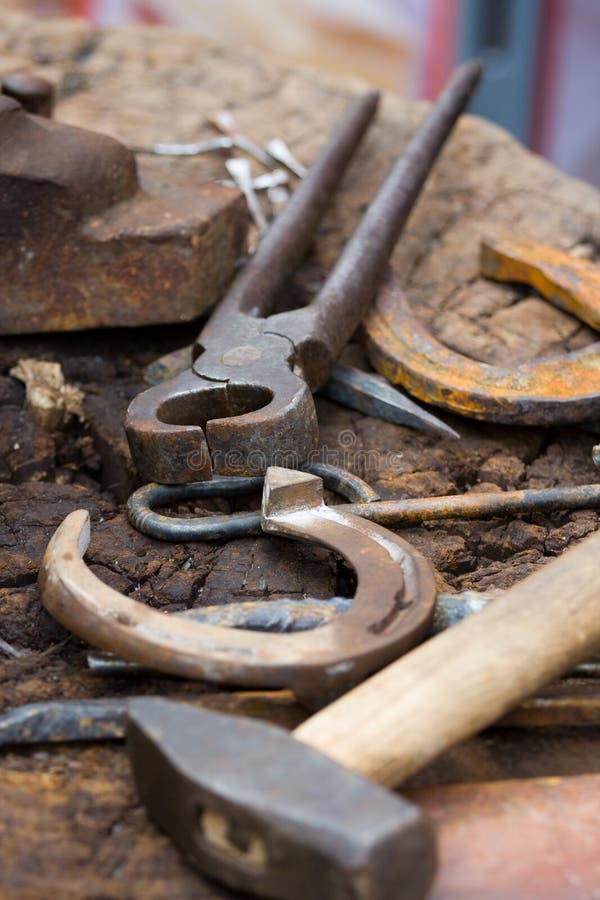 Blacksmith tools and horseshoes close-up