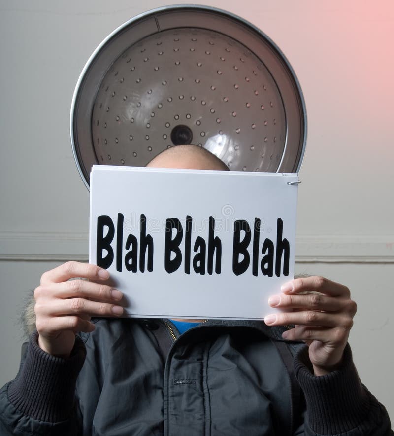 Male holding up a Blah Blah blah Sign. Male holding up a Blah Blah blah Sign