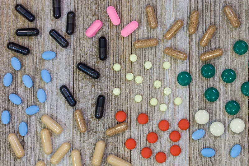 Blandade farmaceutiska medicinpreventivpillerar, minnestavlor och kapselove royaltyfri bild Blandade farmaceutiska medicinpreventivpillerar, minnestavlor och kapselove royaltyfri bild