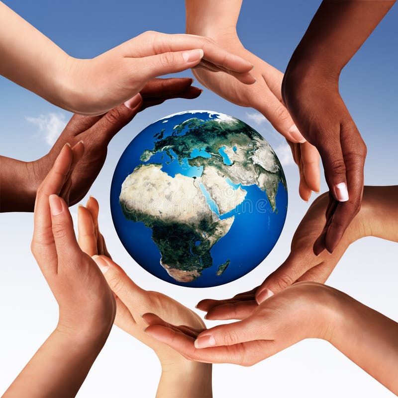 Conceptual peace and cultural diversity symbol of multiracial hands making a circle together around the world the Earth globe on blue sky background. Conceptual peace and cultural diversity symbol of multiracial hands making a circle together around the world the Earth globe on blue sky background