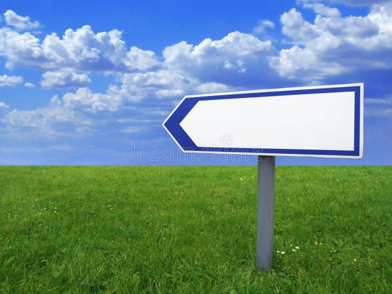 Blank arrow sign, blue sky and green grass royalty free illustration