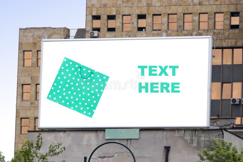 Blank billboard in city with shopping bag