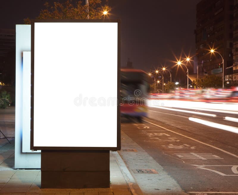 Blank billboard at night in the city Street