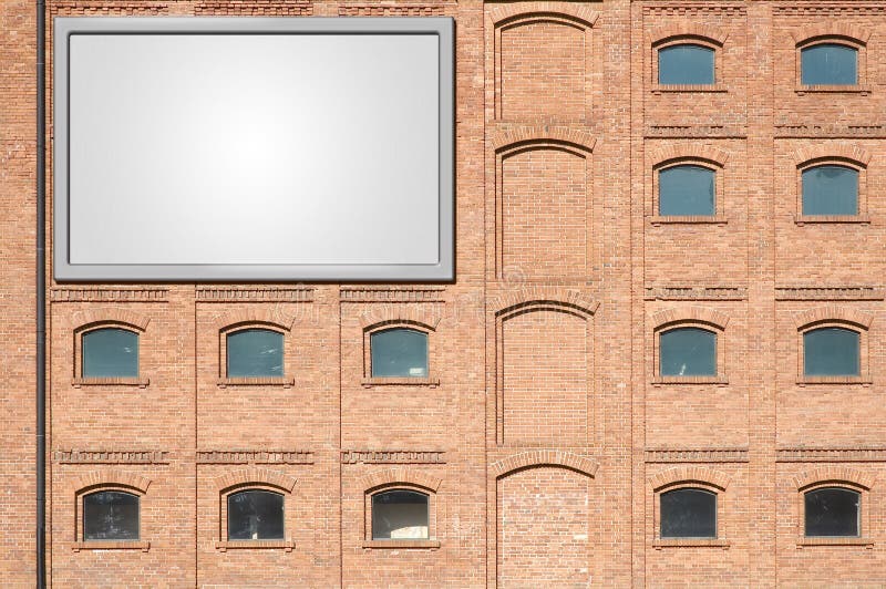 Blank billboard on red brick wall building. Blank billboard on red brick wall building