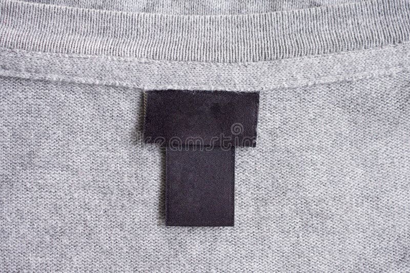 Blank Black Laundry Care Clothing Label on Fabric Texture Stock Photo ...