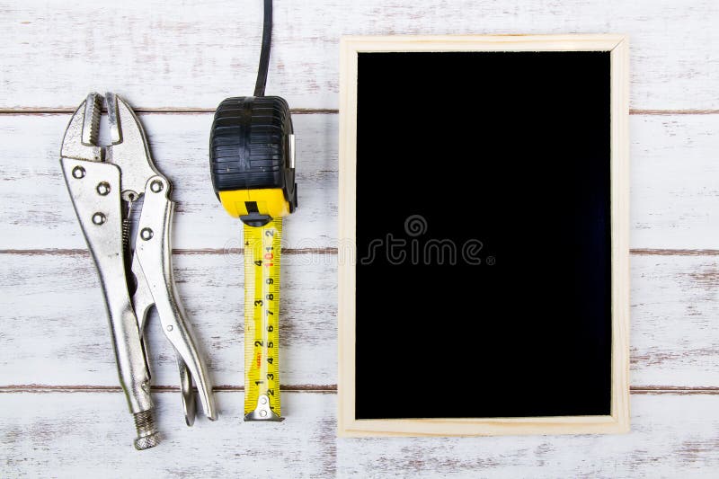 Blank blackboard and Set of repair hand tools. Template mock up f royalty free stock image