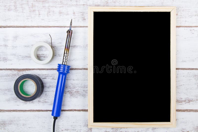 Blank blackboard and Set of repair hand tools. Template mock up f stock photography