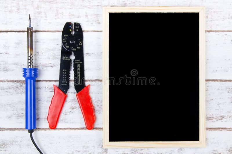 Blank blackboard and Set of repair hand tools. Template mock up f stock images