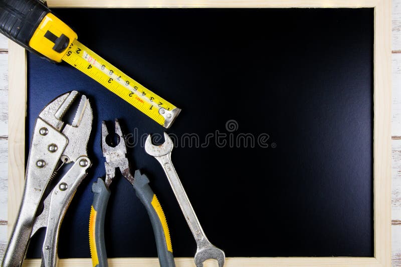 Blank blackboard and Set of repair hand tools. Template mock up f royalty free stock photos