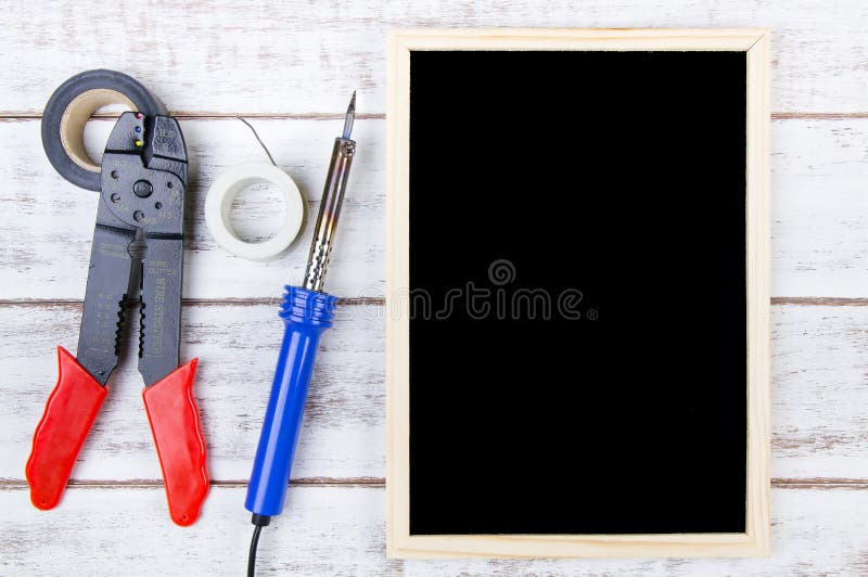 Blank blackboard and Set of repair hand tools. Template mock up f stock images