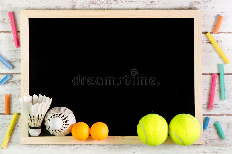 Blank blackboard, Shuttlecock, Ping pong ball and Tennis ball on stock image