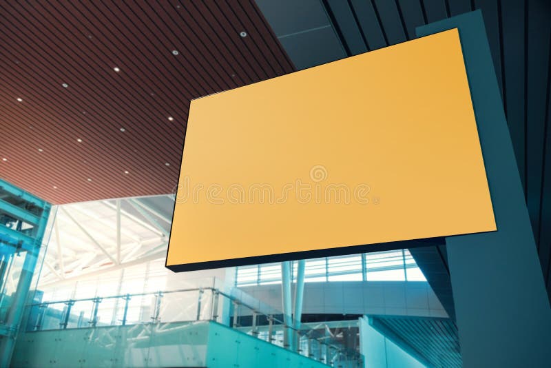 Blank Board for Mockup. Empty Yellow Horizontal Poster. Indoor Scene in Modern Public Building with Clipping Path royalty free stock images