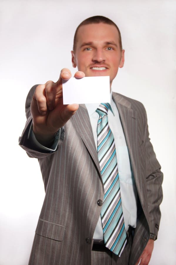 Blank business card in a hand