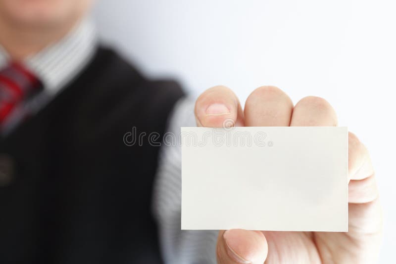 Blank business card in a hand