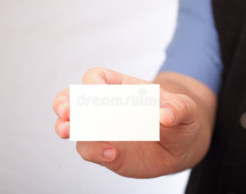 Blank business card in a hand
