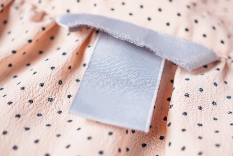 Blank Clothing Label Closeup on Fabric Texture Stock Image - Image of ...