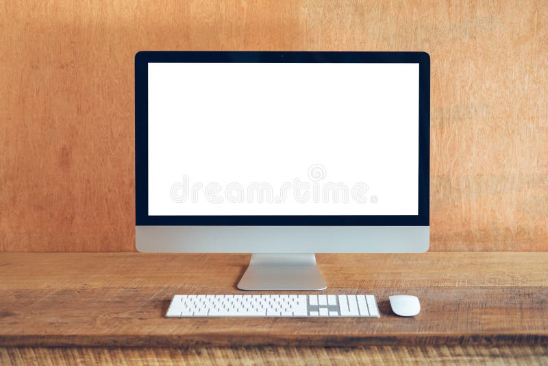 Blank Computer Monitor At Desk In Home Wood House Natural Light