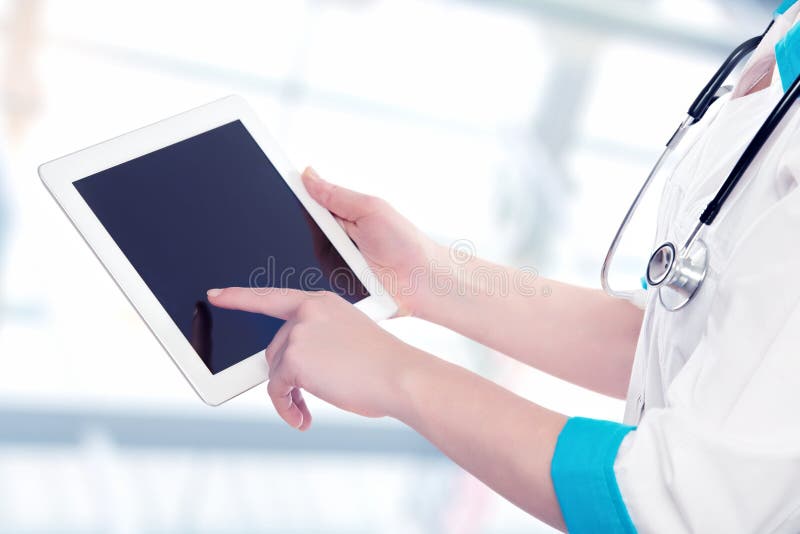 Blank computer tablet in the hands of doctor