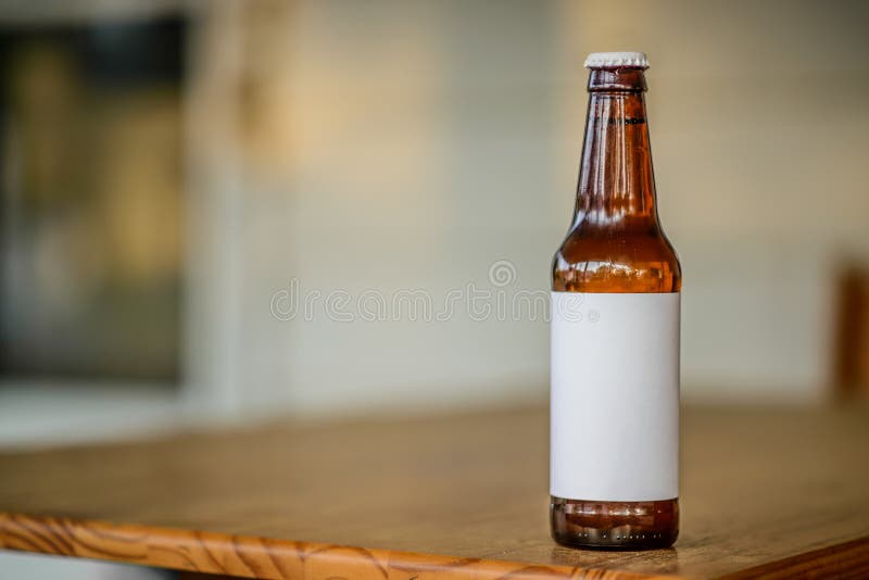 Blank Label Beer Bottle on porch table Copyspace