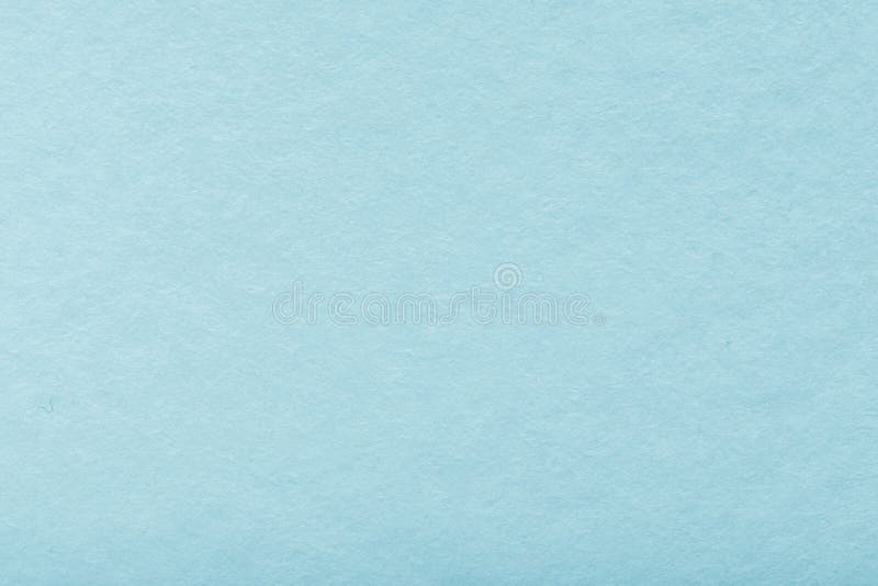Blank old blue paper texture background. Structure of dense turquoise cardboard, large detailed macro closeup stock images