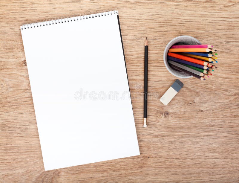 Blank paper and colorful pencils
