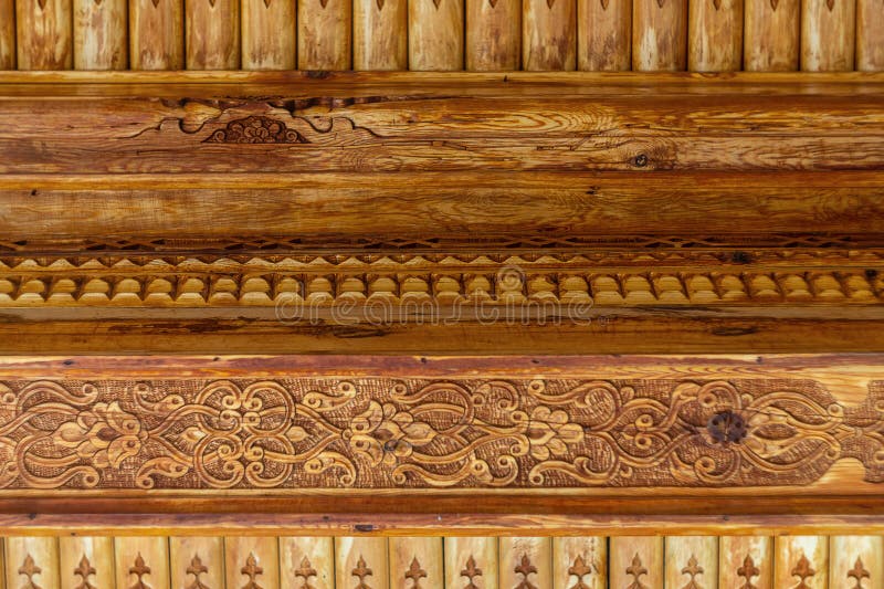 Blank pattern of decorative patterns carved on wooden elements of the interior with flowers, leaves, lines, rows. Hand stock photos