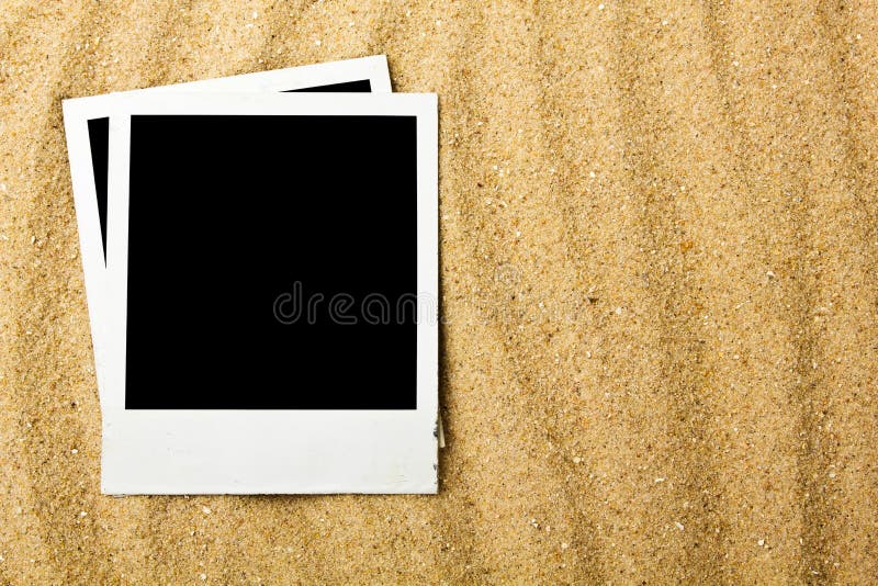 Blank photographs on beach stock image Blank photographs on beach stock image