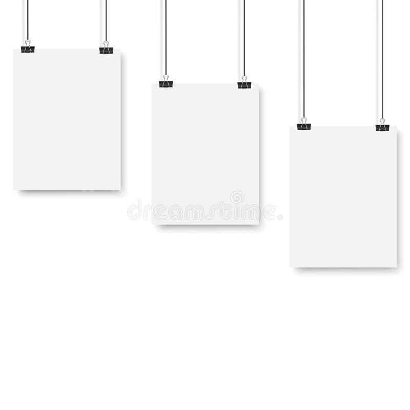 Blank Posters Hanging on a Binder Clips. A4 White Paper Sheet Hangs on
