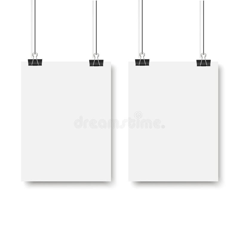 Blank Posters Hanging on a Binder Clips. White Paper Sheet Hangs on a