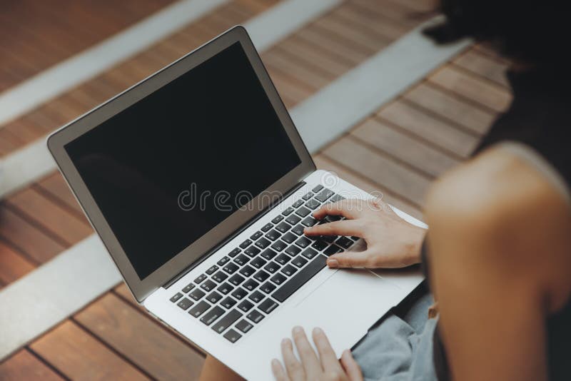 Blank screen with Beautiful young Asian girl working at a college with a laptop stock photos Blank screen with Beautiful young Asian girl working at a college with a laptop stock photos