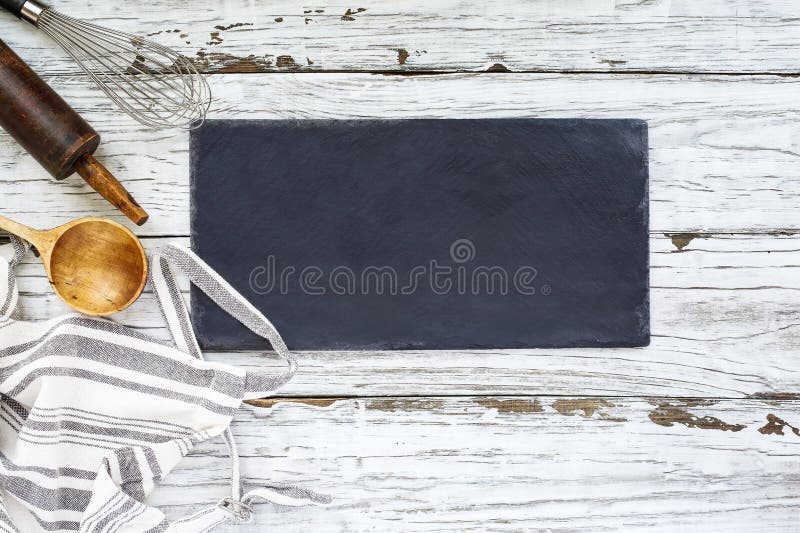 Blank Slate with Rolling Pin and Wooden Spoon