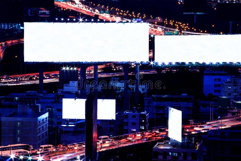 Blank space billboard at night with city traffic and car light