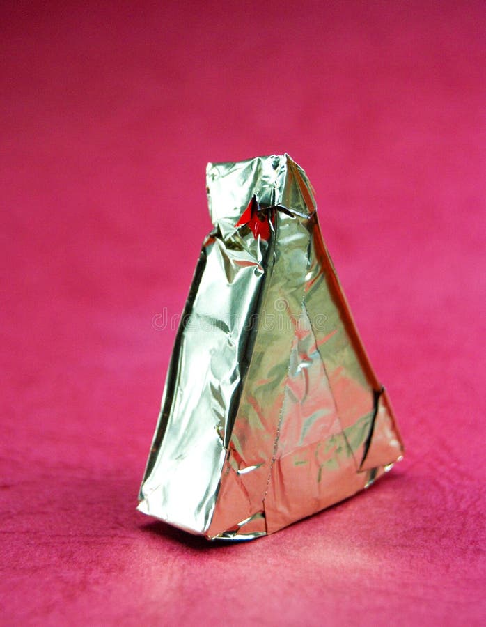 Blank Triangular Processed Cheese with Blank Label on Red Background