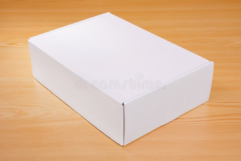 Blank white box on wood stock photo. Image of blank, object 76012640