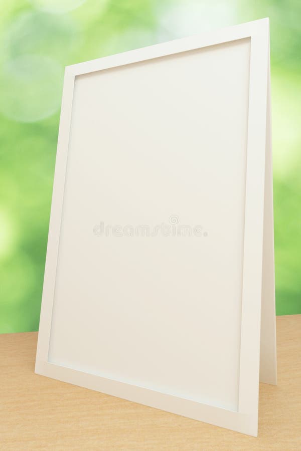 Blank White Picture Frame on Wooden Table Stock Photo Image of blur