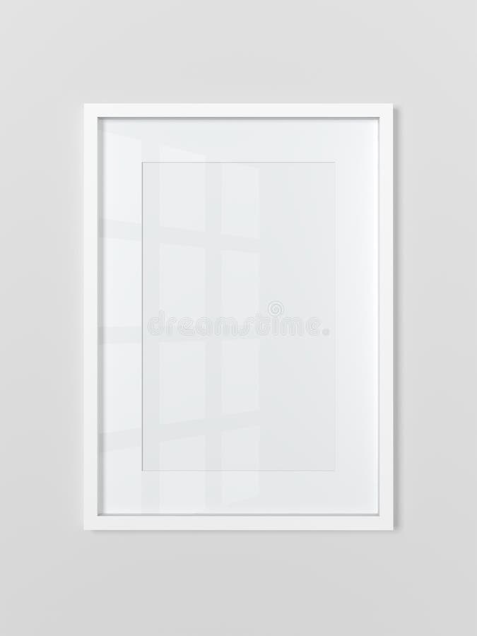 Blank white rectangular photo frame on light gray wall. Vertical.