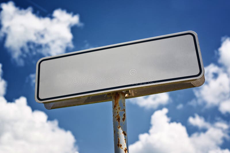 Blank white street sign