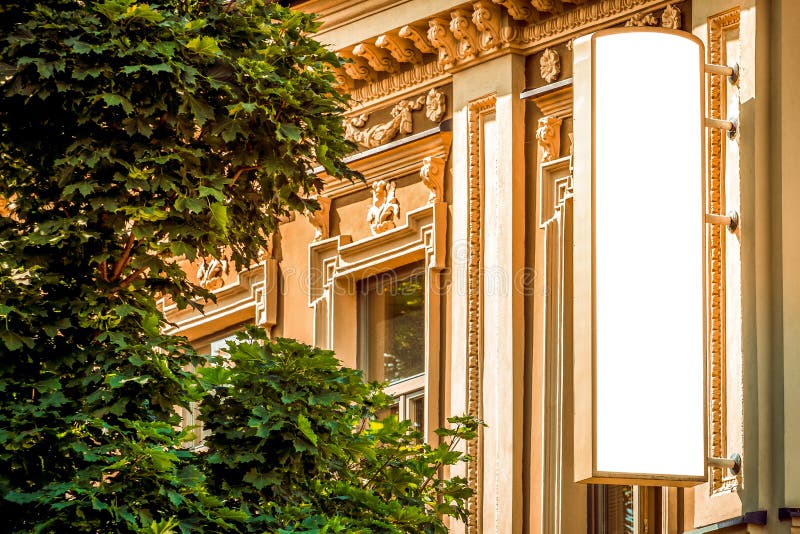 Blank white vertical banner on building facade, design mockup. Empty flag mock up on the side of hotel exterior stock photos Blank white vertical banner on building facade, design mockup. Empty flag mock up on the side of hotel exterior stock photos