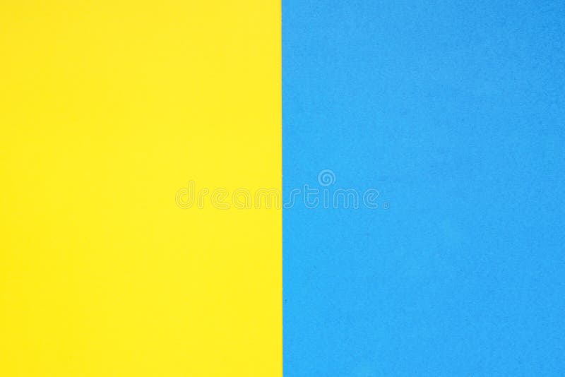 Yellow Paper and White Paper are Stacked on Top of a Blank White Paper
