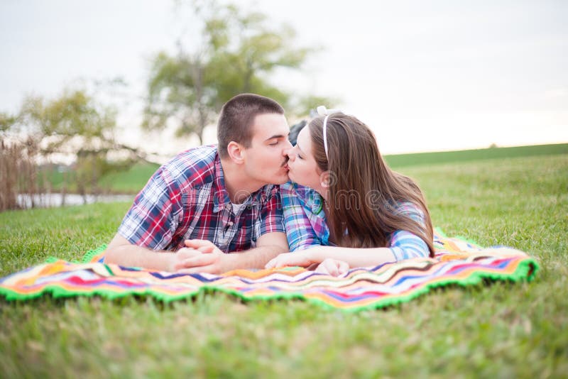 A Kiss on a Blanket stock image. Image of lover, loving 27153839