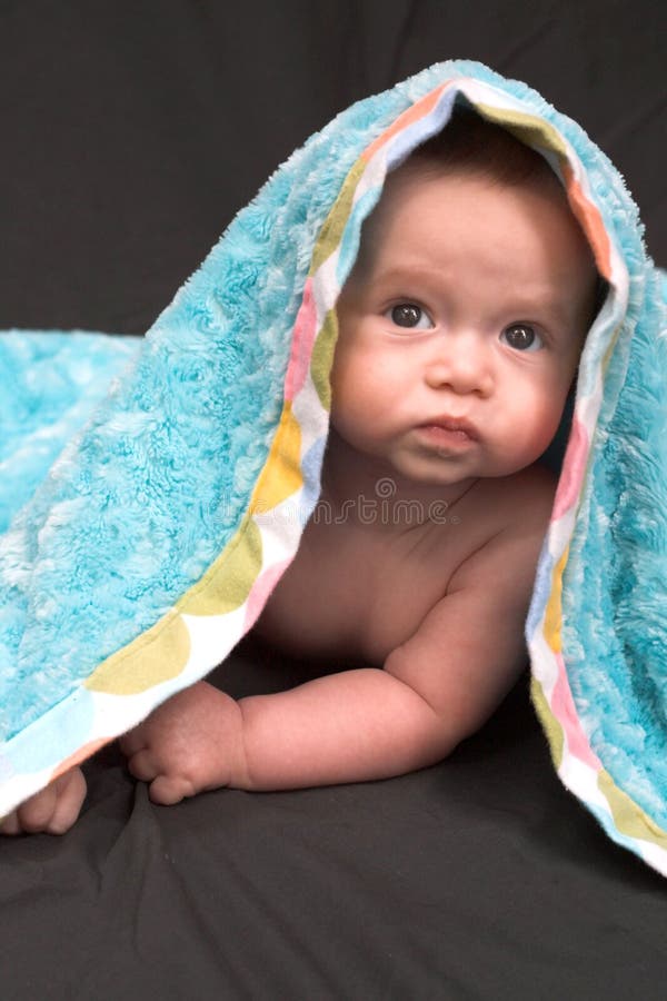Blanket Baby stock image. Image of little, peek, hand 1261371