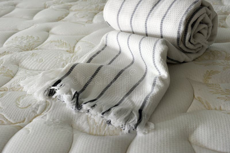 Blanket on bed stock image. Image of textile, roll, fabric 17420143