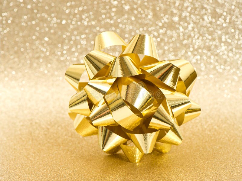 Blankt för härlig bow för bakgrund guld- fotografering för bildbyråer