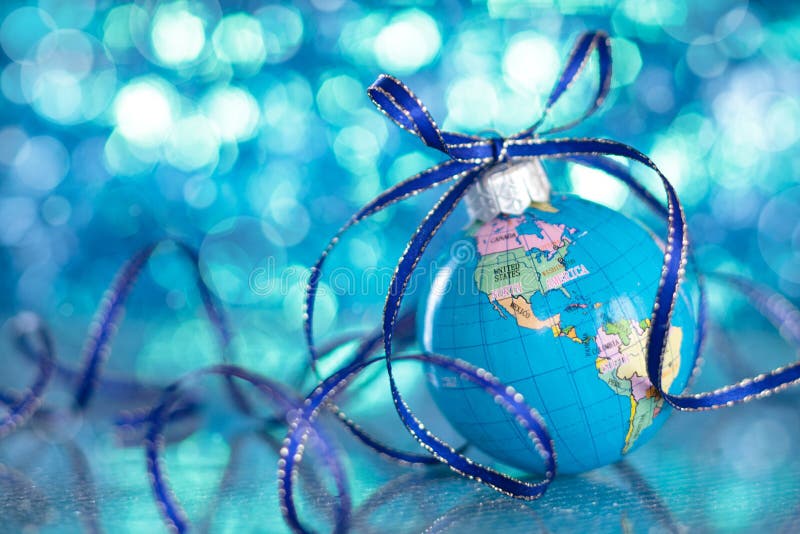 Christmas Globe in blurred blue lights background. Christmas Globe in blurred blue lights background.