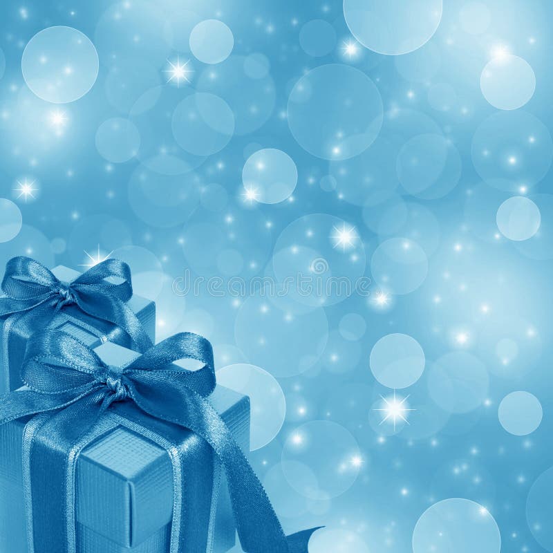 Blue gift box on abstract blue Christmas background. Blue gift box on abstract blue Christmas background