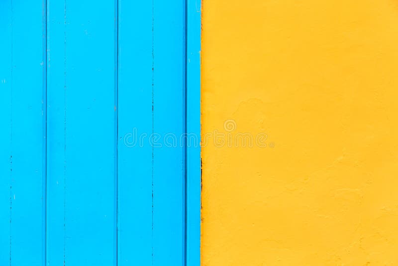 Pastel blue wooden and yellow wall background. Architecture details on Havana, Cuba. Pastel blue wooden and yellow wall background. Architecture details on Havana, Cuba.